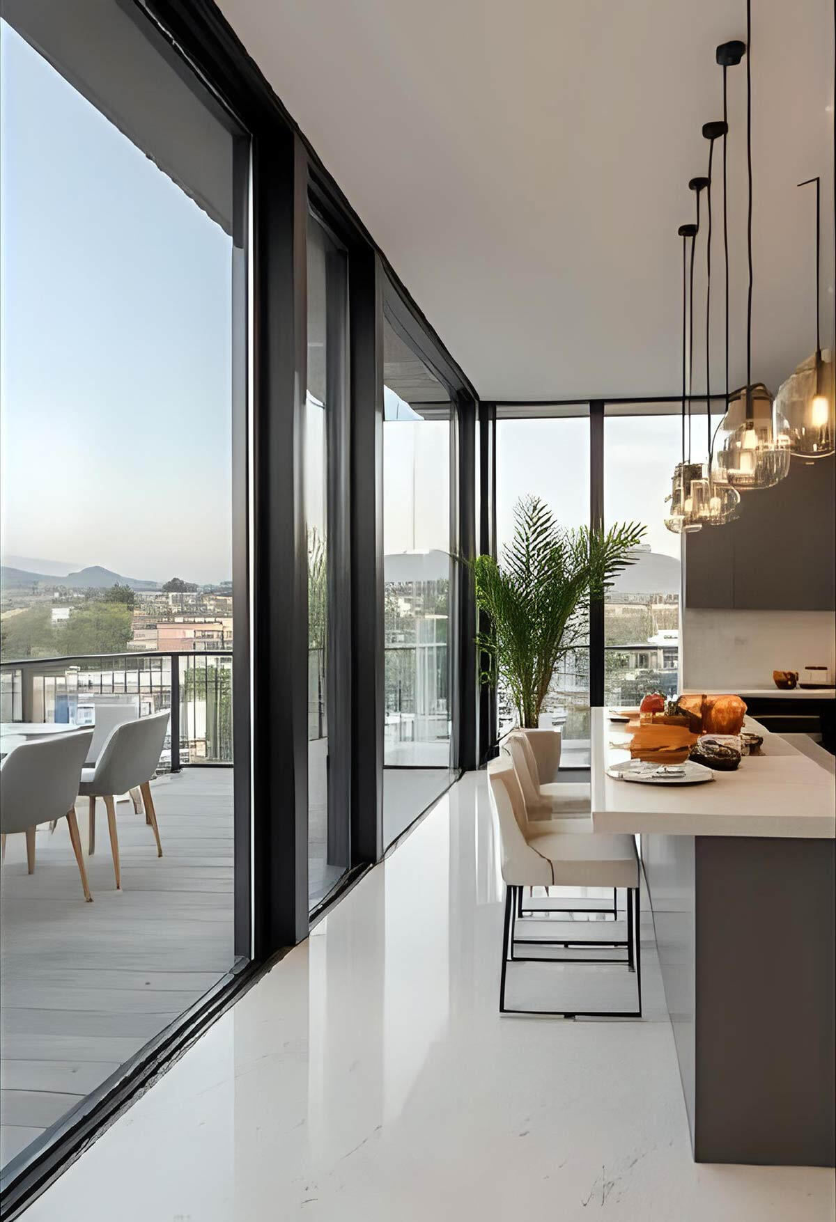 Fotorealistische 3D-Wohnungsvisualisierung: Moderne Küche mit Kochinsel, Designer-Pendelleuchten und Terrasse mit Bergblick